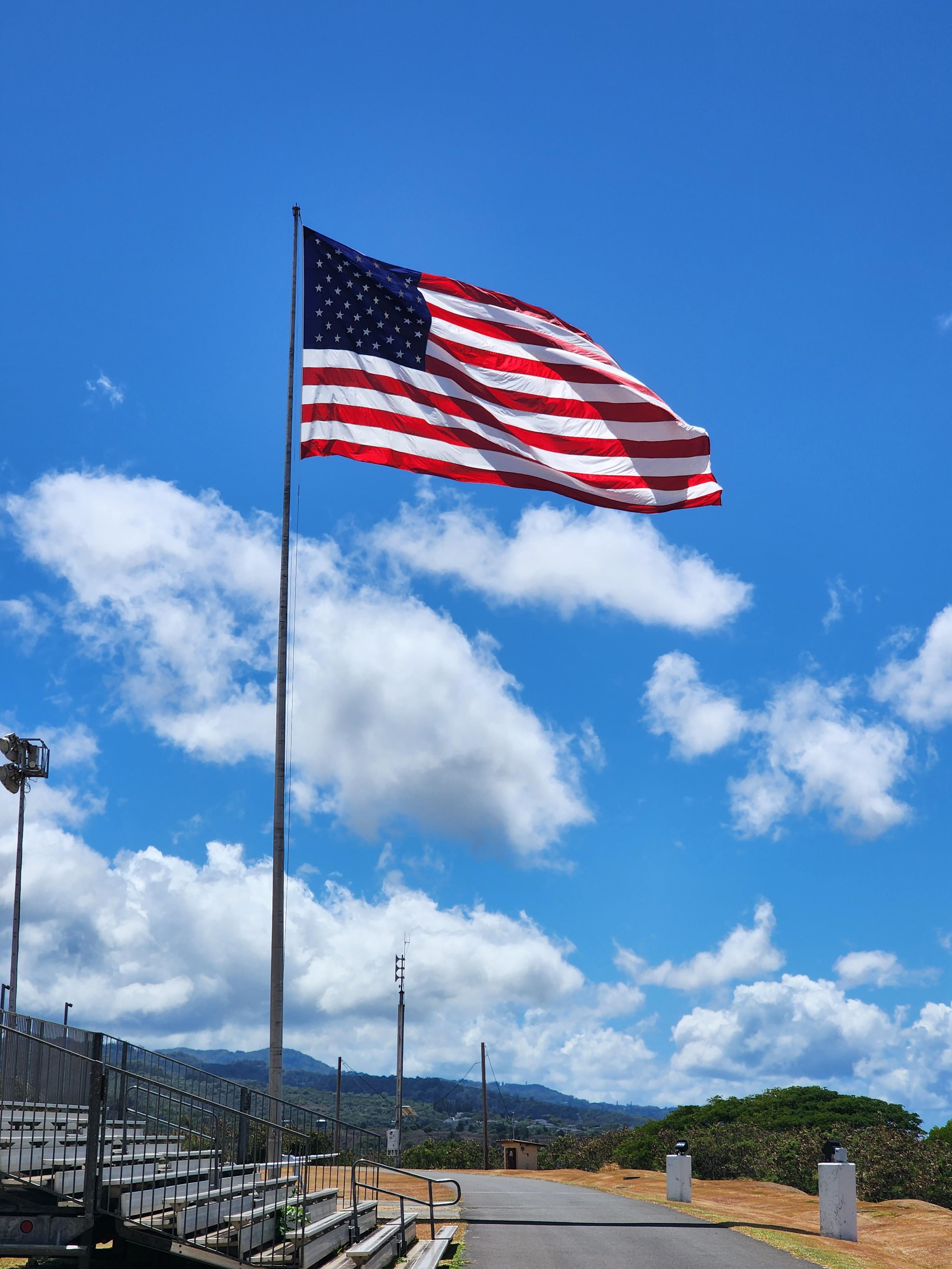 US flag over Camp H.M. Daniel Curtis Smith, HI