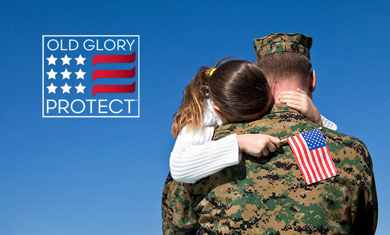 Military father holding his daughter